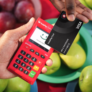 VodaPay Kwika Portable card Machine - image of someone taking a payment using the Kwika